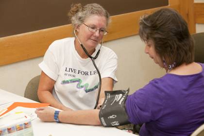 Faculty and staff can receive a slew of free information and services at the Health and Fitness Expo, including blood pressure checks, flu shots and more. Photo by Duke Photography.