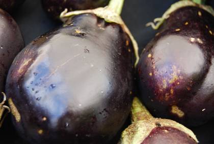 Eggplant is just one of many types of produce shoppers can find at the Duke Farmers Market. Photo by Bryan Roth.