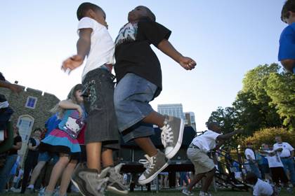 Children celebrate during the 2010 Employee Kick-Off celebration. This year's event will once again feature a free meal and entertainment for faculty, staff and their guests.