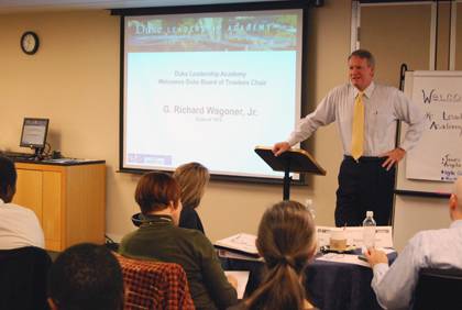 Rick Wagoner, chair of Duke's Board of Trustees, presents to members of Duke's Leadership Academy. Photo by Bryan Roth.