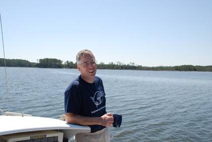 Malkin enjoys a cup of tea aboard his 30-feet long catamaran docked near Oriental, N.C. Photo courtesy of Robert Malkin.