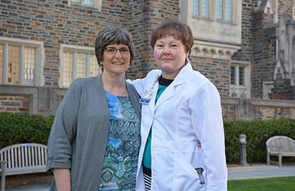 Polly Padgett, left, a nurse with Duke’s Infection Control Outreach Network, referred Shelby Lassiter to a job at Duke last year. Photo by Bryan Roth.