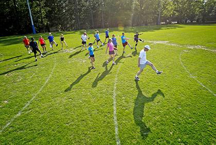 Employees get moving during a Duke Run/Walk Club gathering in the spring. 