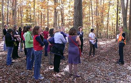 Sara Childs, at right, leads a tour group through Duke Forest. Beginning April 1, Childs will act as director of the Forest. Photo courtesy of Sara Childs.