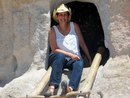 Along with reading, Lillian Spiller also enjoys travel. Here, she stops for a picture while climbing Bandelier National Monument in New Mexico. Photo courtesy of Lillian Spiller.