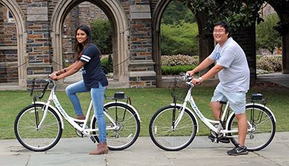 Students Lavanya Sunder and Ray Li pose with new bicycles that will be part of the Zagster bike-share program for students, faculty and staff. With an annual fee, bikes will be available for rent beginning this month. Photo by Chris Heltne.