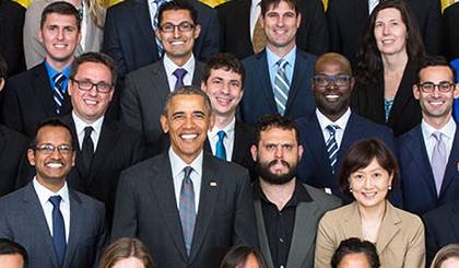 Dr. Kafui Dzirasa, shown second from the right behind President Obama.