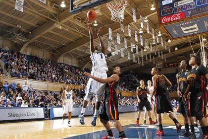 Duke sophomore center Elizabeth Williams scores during last year's game against Maryland. Employees can see Williams, last year's national Freshman of the Year and an All-American, with season tickets to home games at Cameron Indoor Stadium. Photo courte