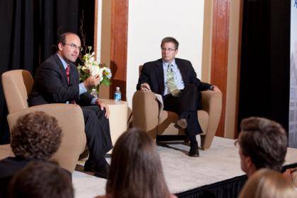 Juan Zarate, left, is interviewed by Duke Professor Peter Feaver.  Photo by Les Todd