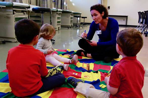 Leigh Ann Simmons, associate professor in nursing and faculty director for ABC Thrive, collects data on preschoolers’ social interactions. (Photo by Andrew Buchanan)