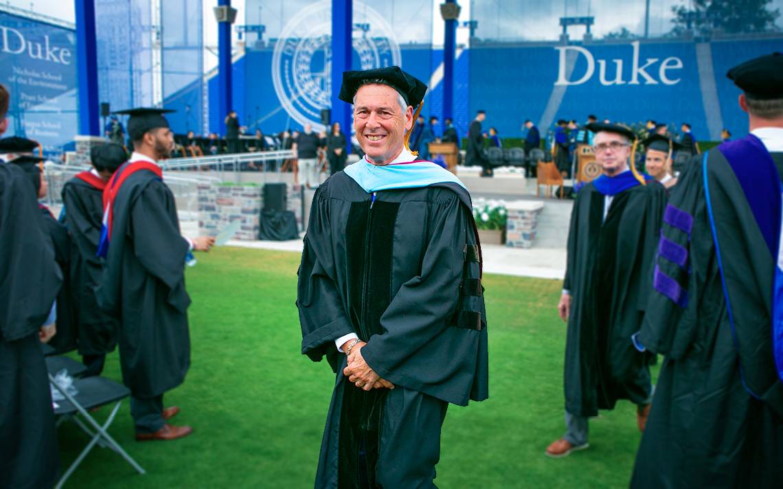 Larry Moneta in regalia leaving Duke’s 2019 Commencement Ceremony