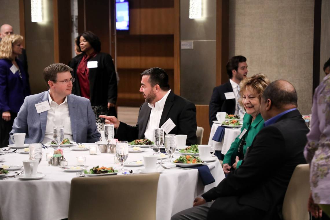 Duke professor Abdullah Antepli, second from left, talks with other Leadership Forum members during the one session held before the pandemic shutdown.