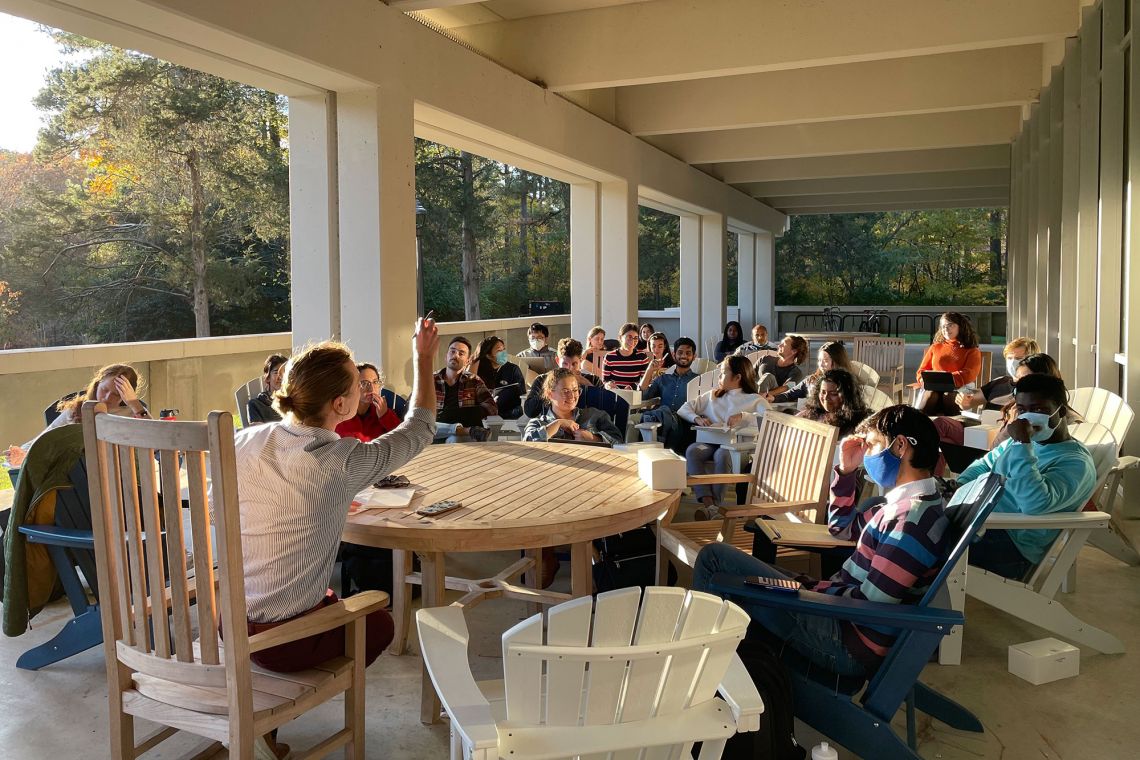 Jonathan Phillips, director of the James E. Rogers Energy Access Project, leads a Policy Perspectives session with students outside Gross Hall in November 2021. 