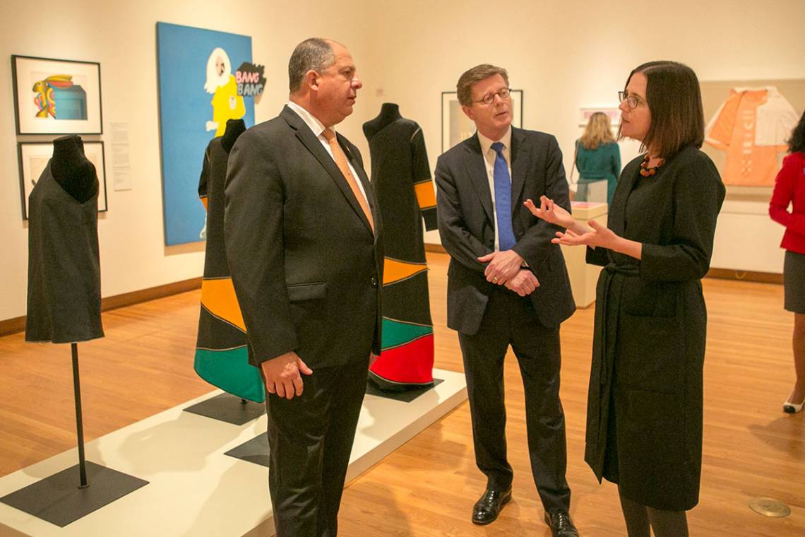 Costa Rican President Solis visits the Pop American exhibit at the Nasher. With him is Duke President Vincent Price and exhibit curator Esther Gabara.