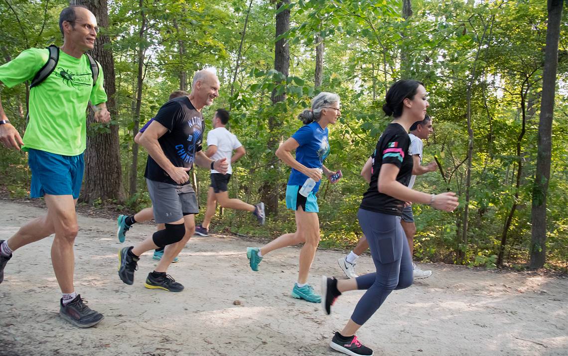 Participants of the Duke Run/Walk Club workout on the Al Buehler Trail. Photo by Les Todd.