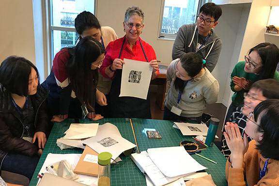 Merrill Shatzman leads a Duke Kunshan class in printmaking and Chinese culture
