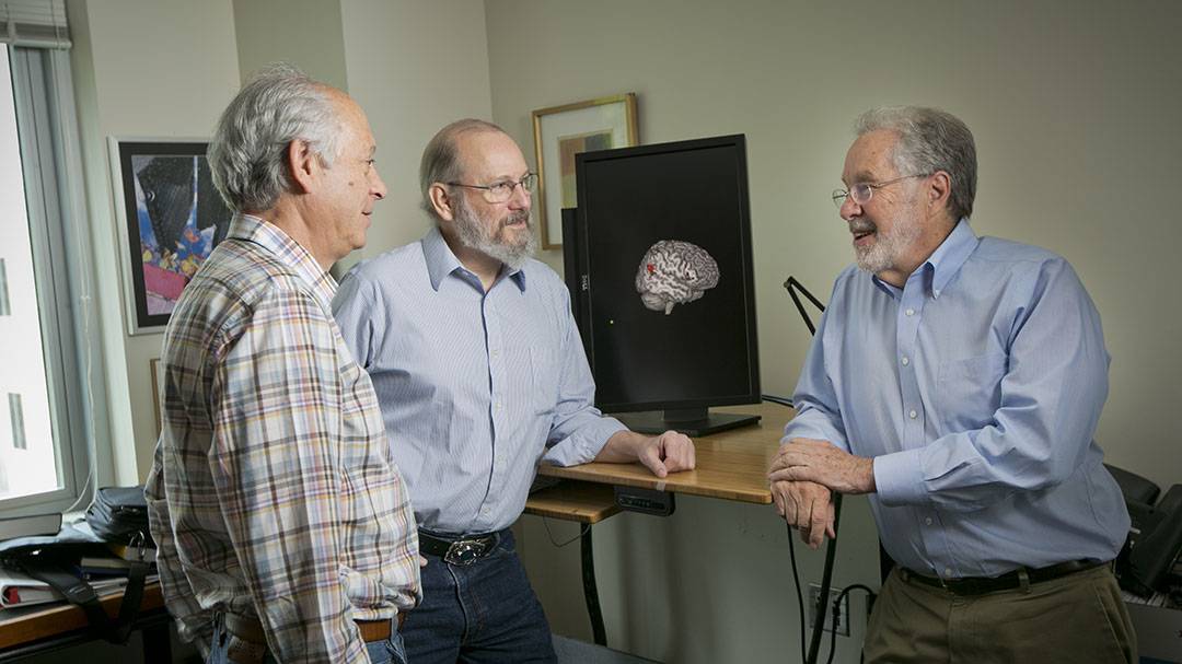 Law professors Donald Beskind (L) and Neil Vidmar (R) joined Pate Skene of Neurobiology in studying jury decisions.