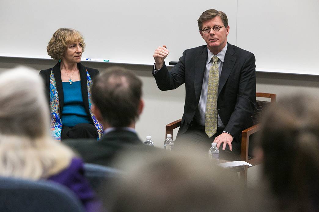 Vince Price talks with faculty during a special session of the Academic Council Thursday. Left is Academic Council Chair Nan Jokerst. Photo by Chris Hildreth/Duke Photography