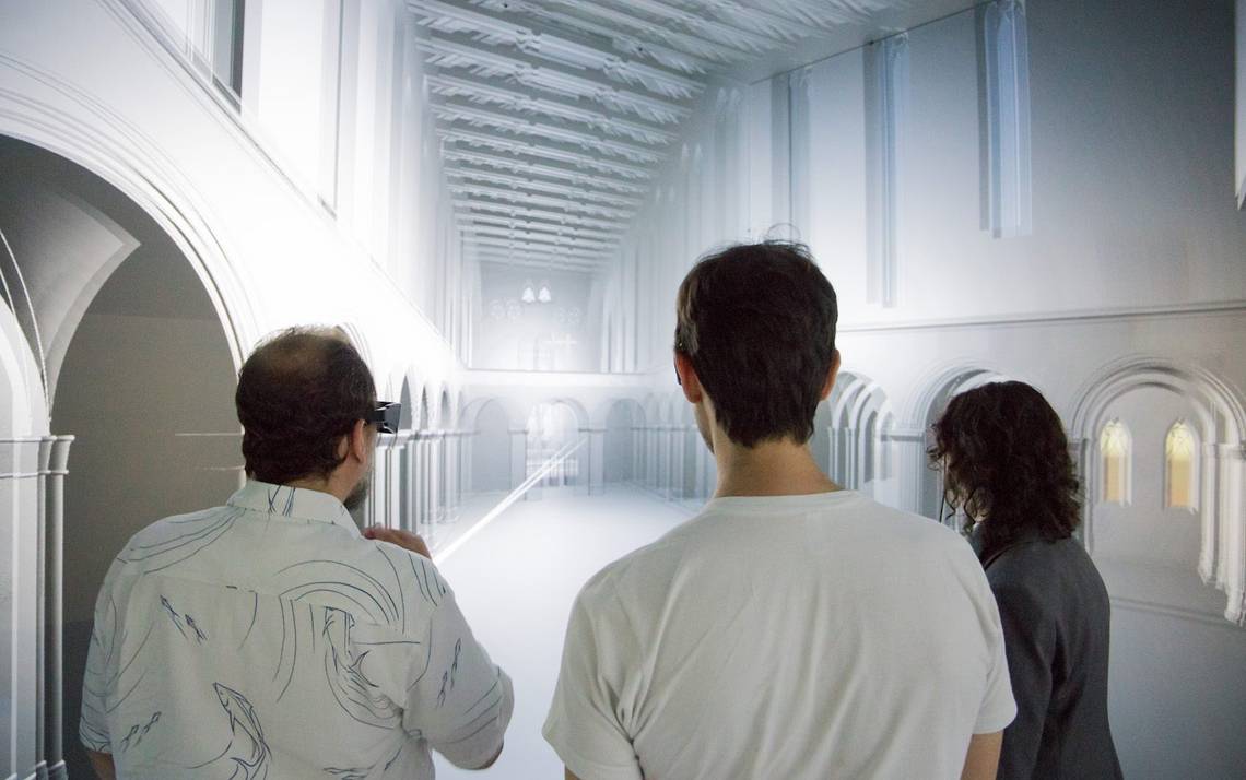 People stand in front of a digital reconstruction of a choir screen at Santa Chiara, a church in Naples. The Wired! Lab hosted two master’s students from the University of Padua who worked on the project. Photo courtesy of the Duke Wired! Lab.