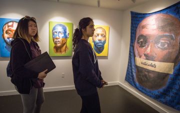 Duke students take in an anti-racism art piece during a workshop activity in 2019. Photo by University Communications.