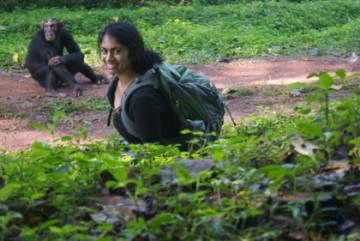 Rachna Reddy and a primate acquaintance in Uganda.