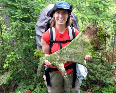 Maria Maschauer with an adult moose antler she found on a scientific vacation with the Earthwatch Institute in northern Michigan. 