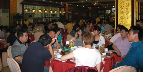 Diners at a Mei Zhou Dong Po restaurant in Beijing 