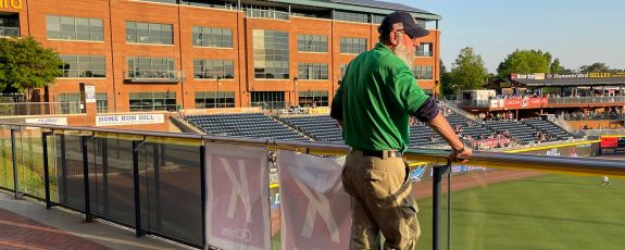 Harris Cooper watches pre-game warmups in advance of a Durham Bulls game.