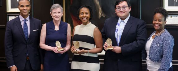 Provost Alec D. Gallimore with Sullivan Award winners Colleen Scott, Adrienne Jones and Elaijah Lapay. On right is Domonique Redmond