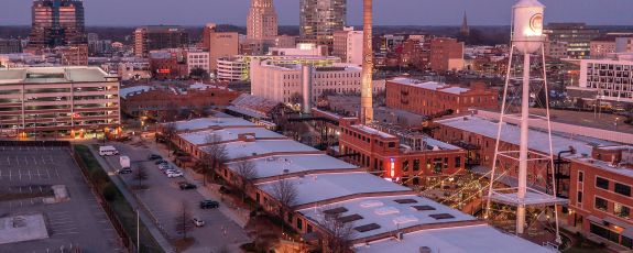 The Durham skyline: A celebration of local heroes during Saturday's Durham Day football game comes out of the many partnerships between the city and university.