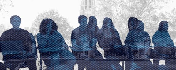 Duke's campus is the faded grey background. In the foreground are seated figures in a blue/black duo-tone, so their features are blurred.