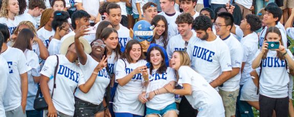 The Class of 2028 celebrates with the Blue Devil mascot at its class photo