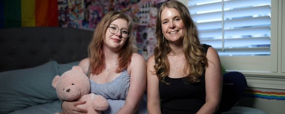 Duke University Grants and Contracts Administrator Anna Gibson, right, found security in her medical coverage when her daughter, Audrey, needed a heart transplant last year. Photo by Travis Stanley.