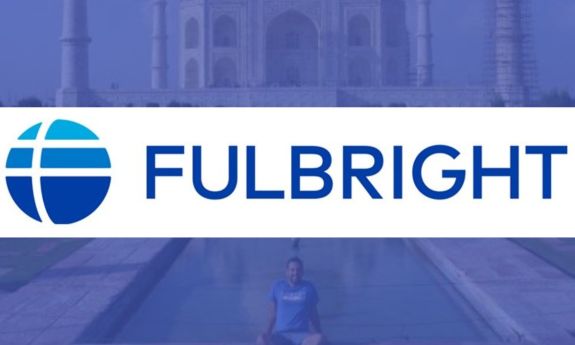 Fulbright logo place over a scholar at the Taj Mahal