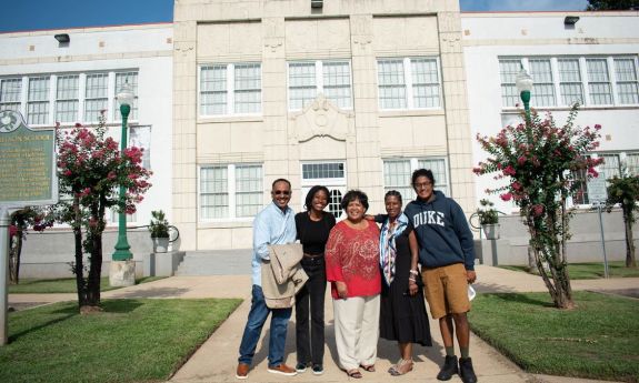 Mississippi Delta National Heritage Area Director Rolando Herts; Duke Robertson Scholar Jenna Smith; Reena Evers-Everette; Chaunté Smith; and Duke Robertson Scholar Vishal Jammulapati, in Jackson, Mississippi, pose outside the Smith Robertson Museum and Cultural Center. Smith and Jammulapati spent summer 2022 documenting Civil Rights history for the Mississippi Delta National Heritage Area. Photo courtesy of Vishal Jammulapati.