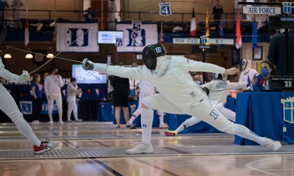 Duke fencer in action in a 2022 meet in Card Gym