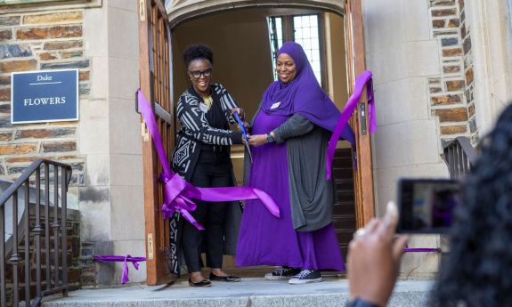 Stacia Solomon, director of the Mary Lou Williams Center, and Samaiyah Faison, assistant director, cut the ribbon during the reopening event for the Mary Lou Williams Center for Black Culture.