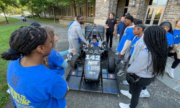 Students check out a race car during Duke-Durham School Days.