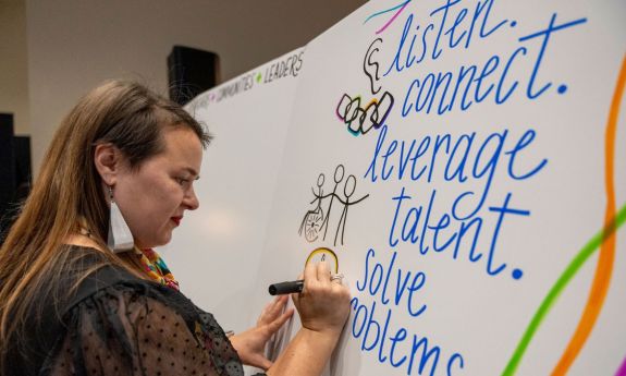 Setting up an activity board at the launching event for the Community Engagement Center.