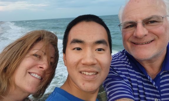 The Lee family pose for a photo