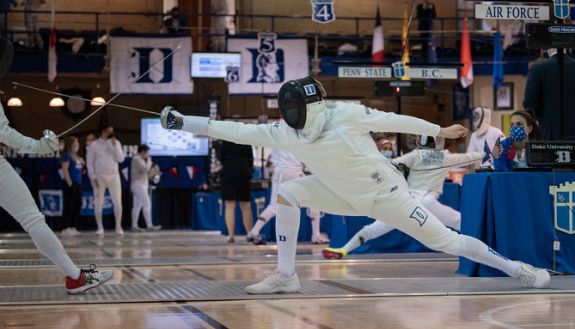 Duke fencer in action in a 2022 meet in Card Gym