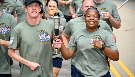 Lt. Whitney McKoy of the Duke University Police Department, right, participates in the Special Olympics of North Carolina torch run. Photo courtesy of the Special Olympics of North Carolina.