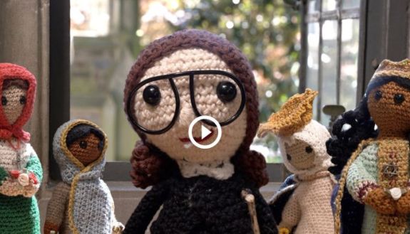 Youtube thumbnail of crocheted dolls