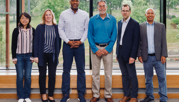 Duke’s 2023 ACC Academic Leadership Network Fellows Hai “Helen” Li, Sharon Gerecht, Patrick Smith (from left) and Timothy Johnson (second from right) at Syracuse University, joined by Craig Henriquez and Abbas Benmamoun from Duke Faculty Advancement