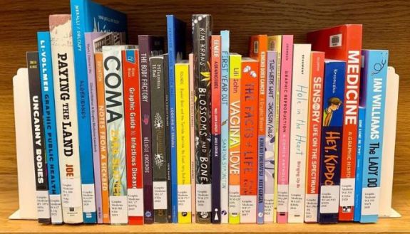 medical center library bookshelf with graphic novels