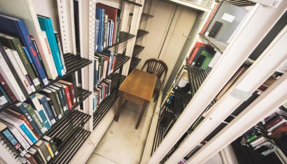 desk hidden in stacks of Lilly Library