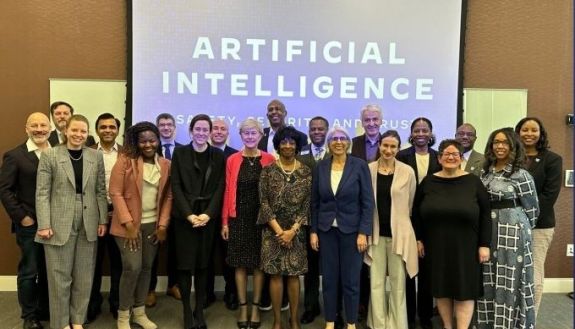 Group of people gathered for the roundtable discussion on AI