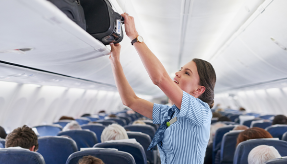 Flight attendant on a plane