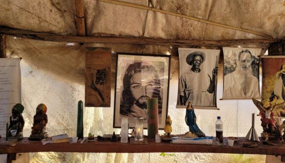 Photos and objects on an altar in the Church of Santo Daime reflect a collage of faith influences. 