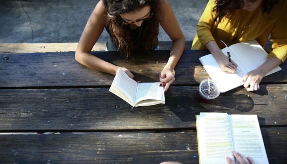 students reading outside at a rural high school